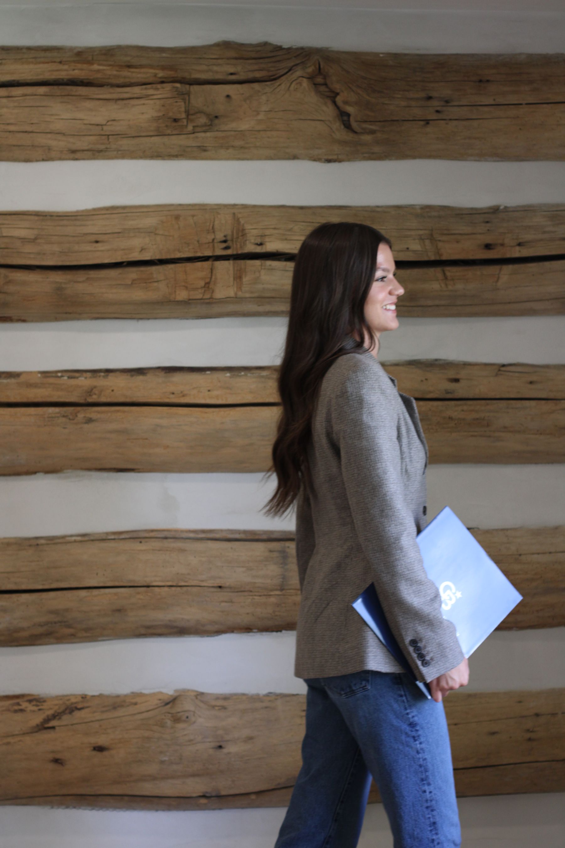 Alexa Keys with a Coldwell Banker presentation folder
